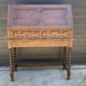 RESTORATION of an early 20th century English oak Jacobean revival writing bureau.
