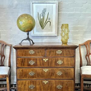 A rare early 18th century George I wild figured country walnut chest of drawers.