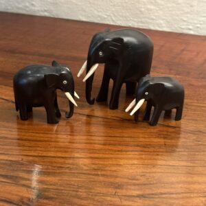 19th century solid ebony carved elephants.