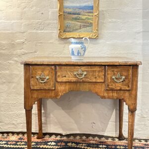 Early 18th century George I period figured walnut lowboy.