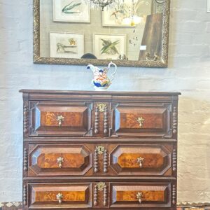 A well patinated last quarter 19th century English joined chest, in late 17th century William & Mary style.