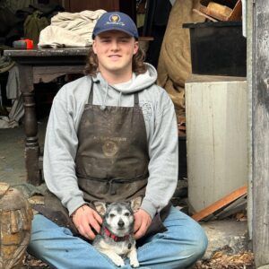 Charlie in workshop with Jack, our dog.