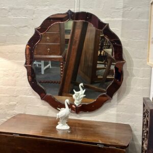 Mid century Venetian retro coloured glass serpentine shaped mirror.