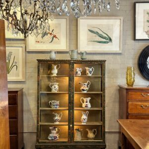 A most beautiful 19th century French green chinoiserie display cabinet of narrow proportions