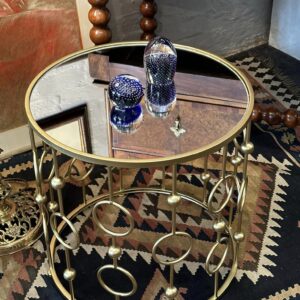 A decorative geometric metal coffee/side table