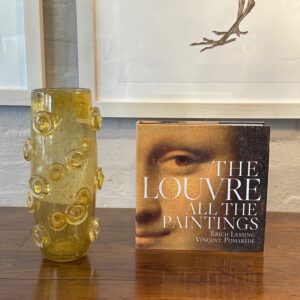 I’m selling a copy of The Louvre, All The Paintings.