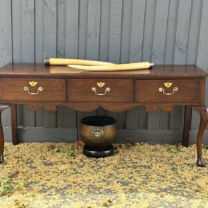 An attractive last quarter century English Oak low dresser.