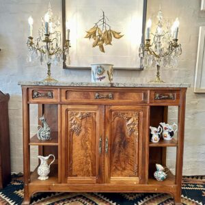 A rare and unusual, early 20th century French walnut Art Nouveau open shelved sideboard.