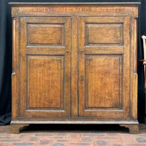 19th century English oak two door cupboard in 18th century style.