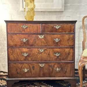 18th century English country figured walnut chest or drawers of smaller dimensions.