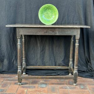 Last quarter 17th century English oak side table.