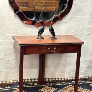 A rare George III Cuban mahogany folding tea table.