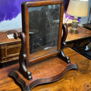 Third quarter 19th century English figured mahogany toilet/make-up mirror.