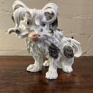 German Meissen style model of a Bolognese hound.
