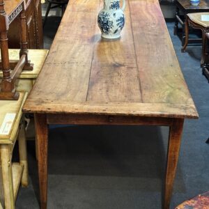 A wonderfully long, well faded French cherry-wood farmhouse table.