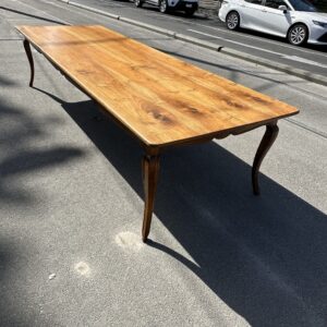 19th century French cherrywood Louis XV 'style' dining table of unusually large proportions.