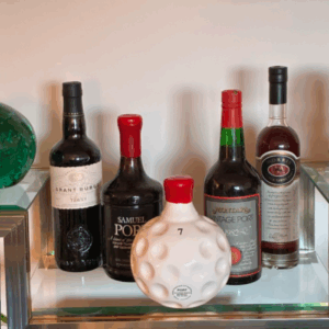 A customer's selling their private collection of 22 bottles of Australian port. 