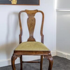 A rare set of six 1920s revival dining chairs