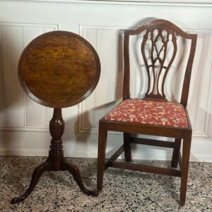 One from a matched set of eight 18th century English fruit wood, elm and ash country Hepplewhite dining chairs.
