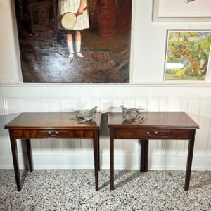 A matched pair of 18th century English side/bedside tables.