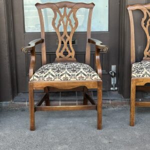 An exceptional set of six English elm country Chippendale style dining or occasional chairs.