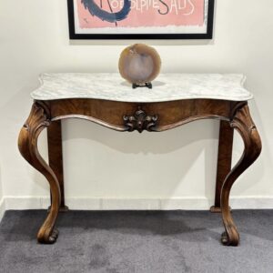 A delightful 19th century European figured walnut entrance, hall, side, console table, of narrow proportions.